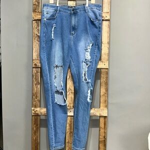Fashion nova “ needing something “ medium blue wash jeans. Size 2X. NWT.